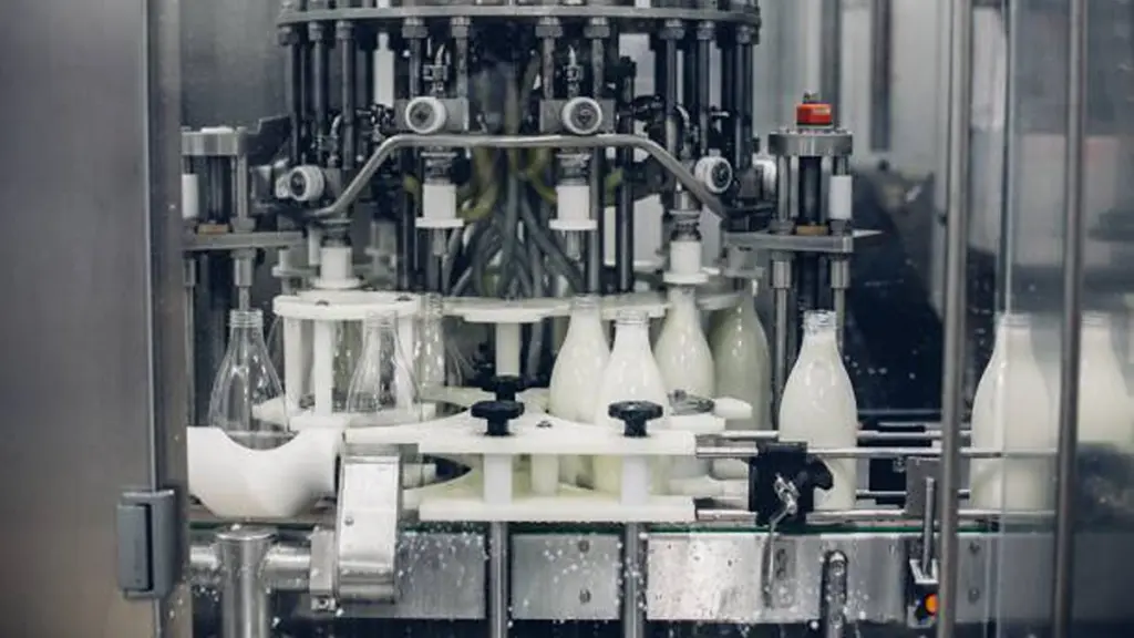 milk bottle packaging machine in a factory
