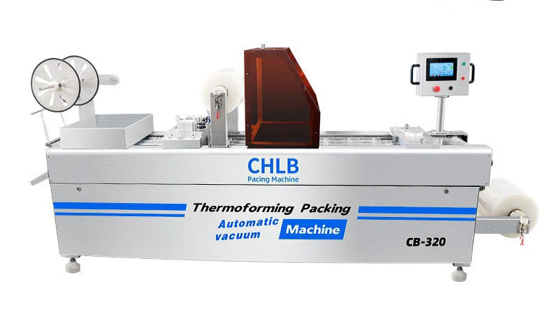 Industrial thermoforming vacuum packaging machine CB-320 with examples of packaged meat and fish.